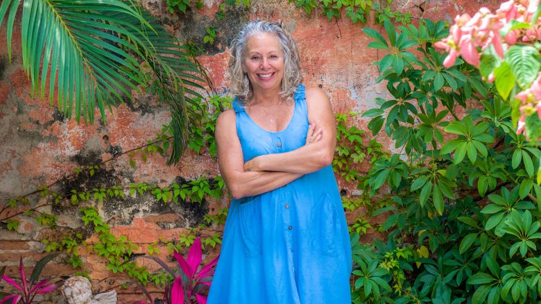 JanetBlaser_MexicoExpat_me-blue-dress-wall.jpg