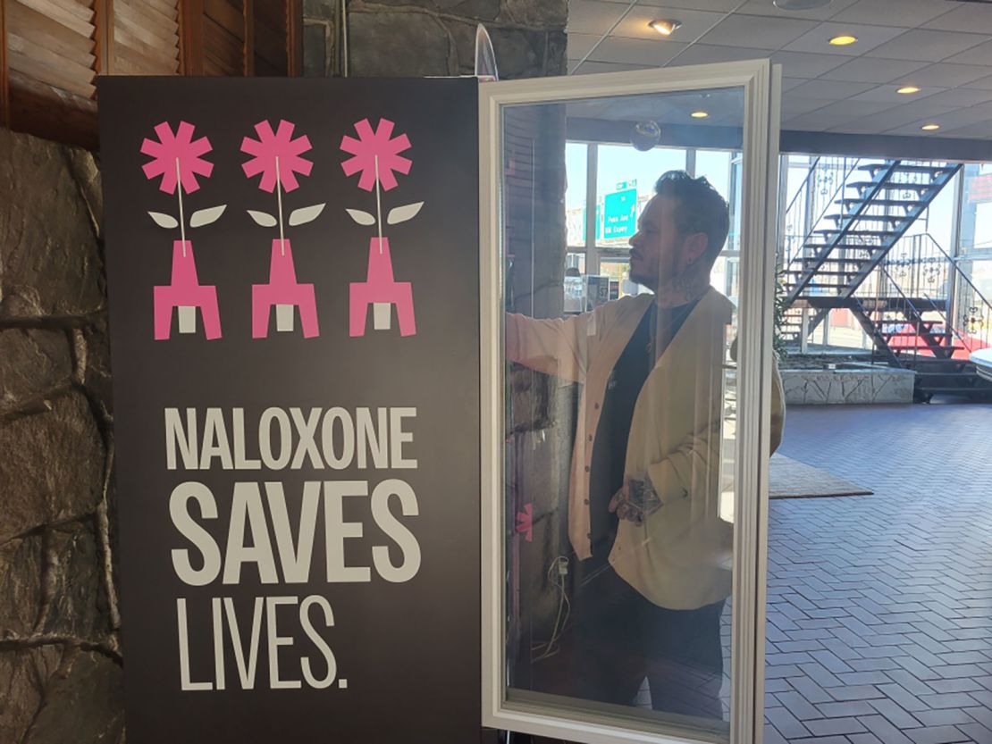 Jason Hall refills a naloxone vending machine in Oklahoma on Sunday, February 18.