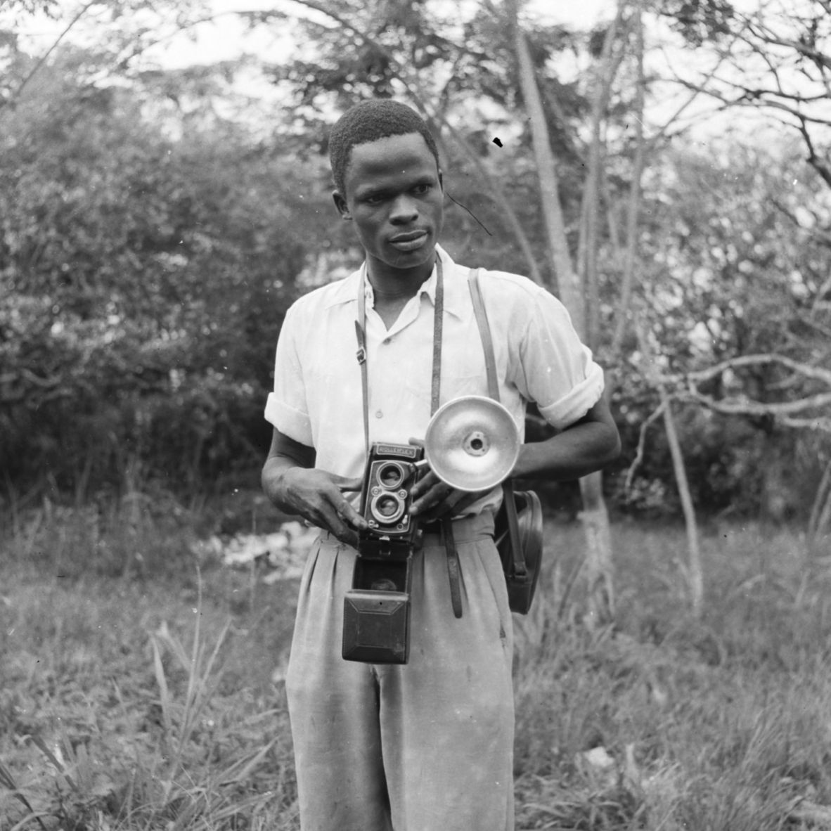 A photo of a young J.D Ojeikere in 1957.