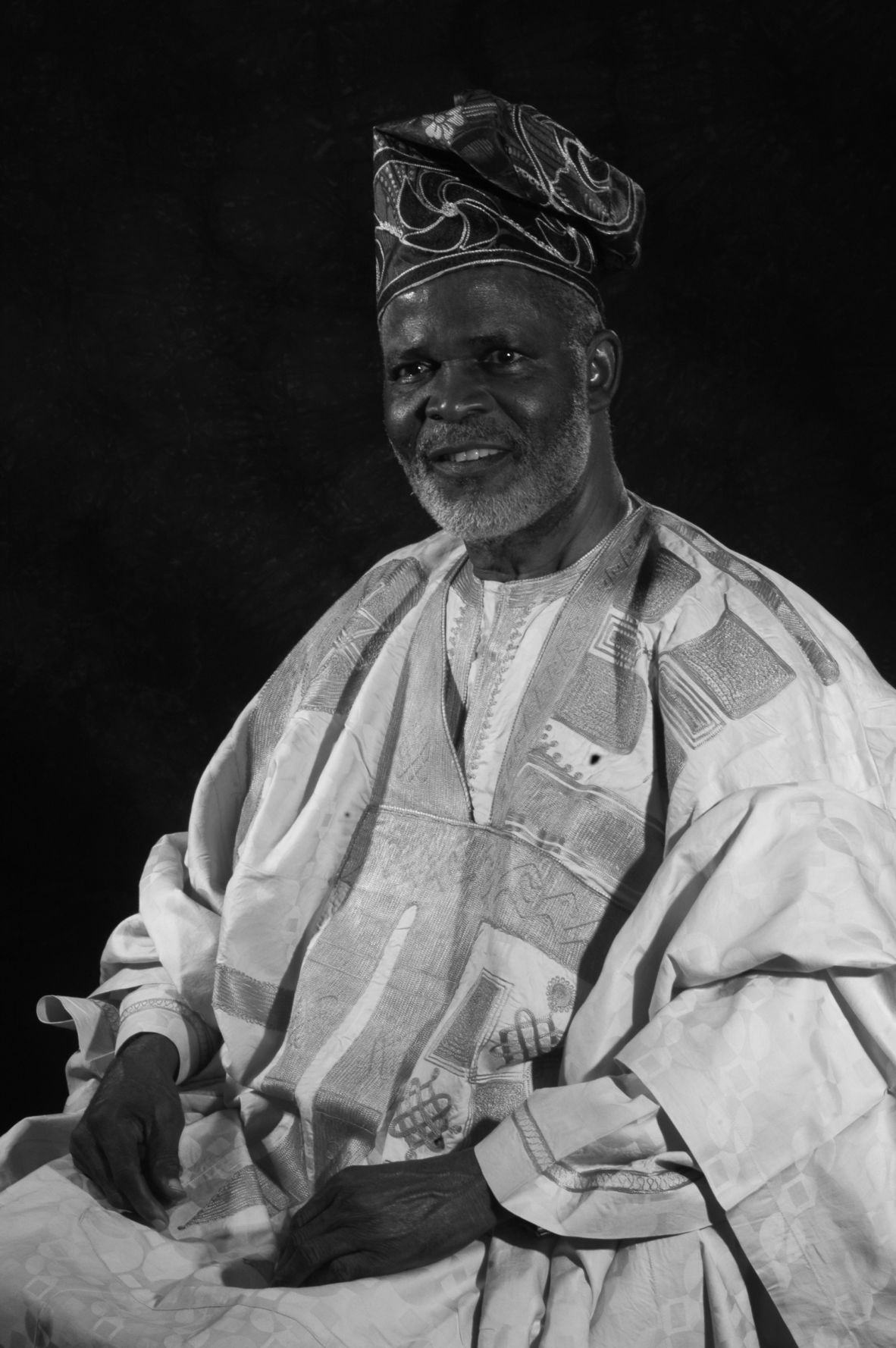 A studio portrait of J.D ‘Okhai Ojeikere taken by his son Amaize Ojeikere. The artist photographed key moments in Nigerian history over his six-decade career.