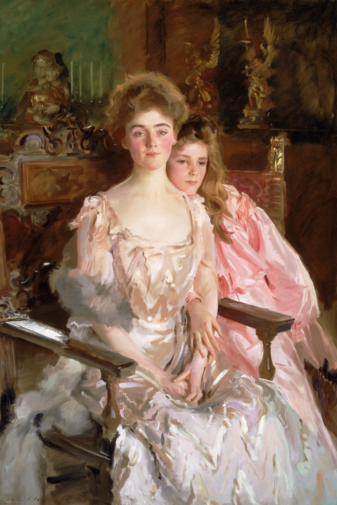 From left to right, Gretchen and her daughter Rachel Warren posed for Sargent in 1903. Rachel was styled in a scrap of pink fabric which Sargent manipulated on canvas to become a dress.