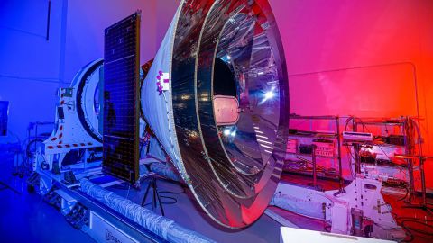 NASA's SPHEREx space observatory was photographed at BAE Systems in Boulder, Colorado, in November 2024 after completing environmental testing. The spacecraft's three concentric cones help direct heat and light away from the telescope and other components, keeping them cool.