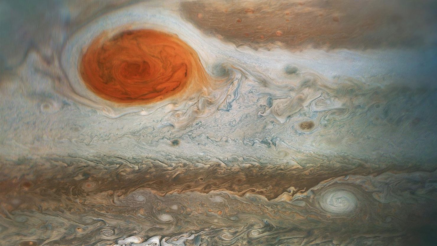 Jupiter’s Great Red Spot can be seen in an image captured by NASA's Juno spacecraft as it flew by the storm in 2018.