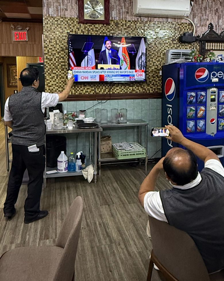 Staff at Kabab King record Zohran Mamdani's victory speech on Tuesday, November 4.
