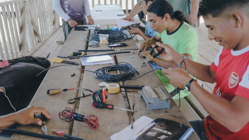 The program is expanding to other countries. Pictured, Kara Solar technicians training Wampís people, from Peru.