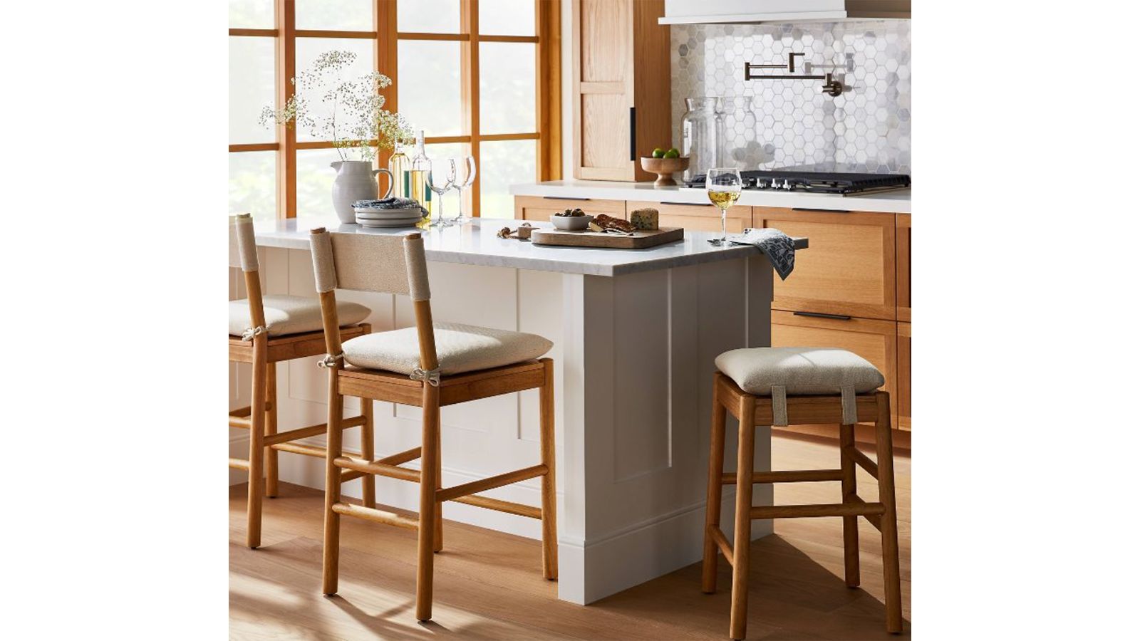 https://media.cnn.com/api/v1/images/stellar/prod/kardashian-kitchen-threshold-designed-with-studio-mc-gee-emery-wood-counter-height-barstool.jpg?q=h_900,w_1600,x_0,y_0