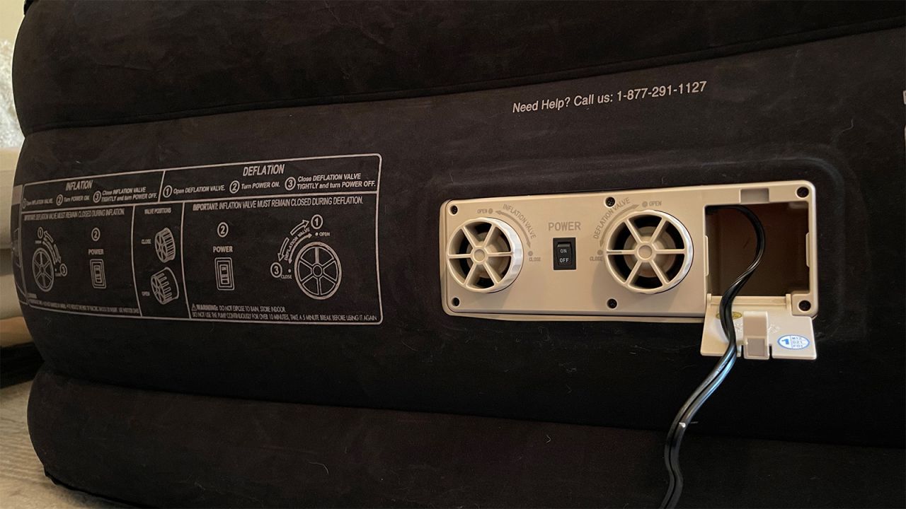 Image of the side of a King Koil air mattress, showing the built-in pump mechanism