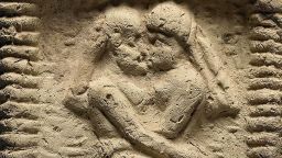 Babylonian clay model showing a nude couple engaged in kissing. Date: 1800 BC