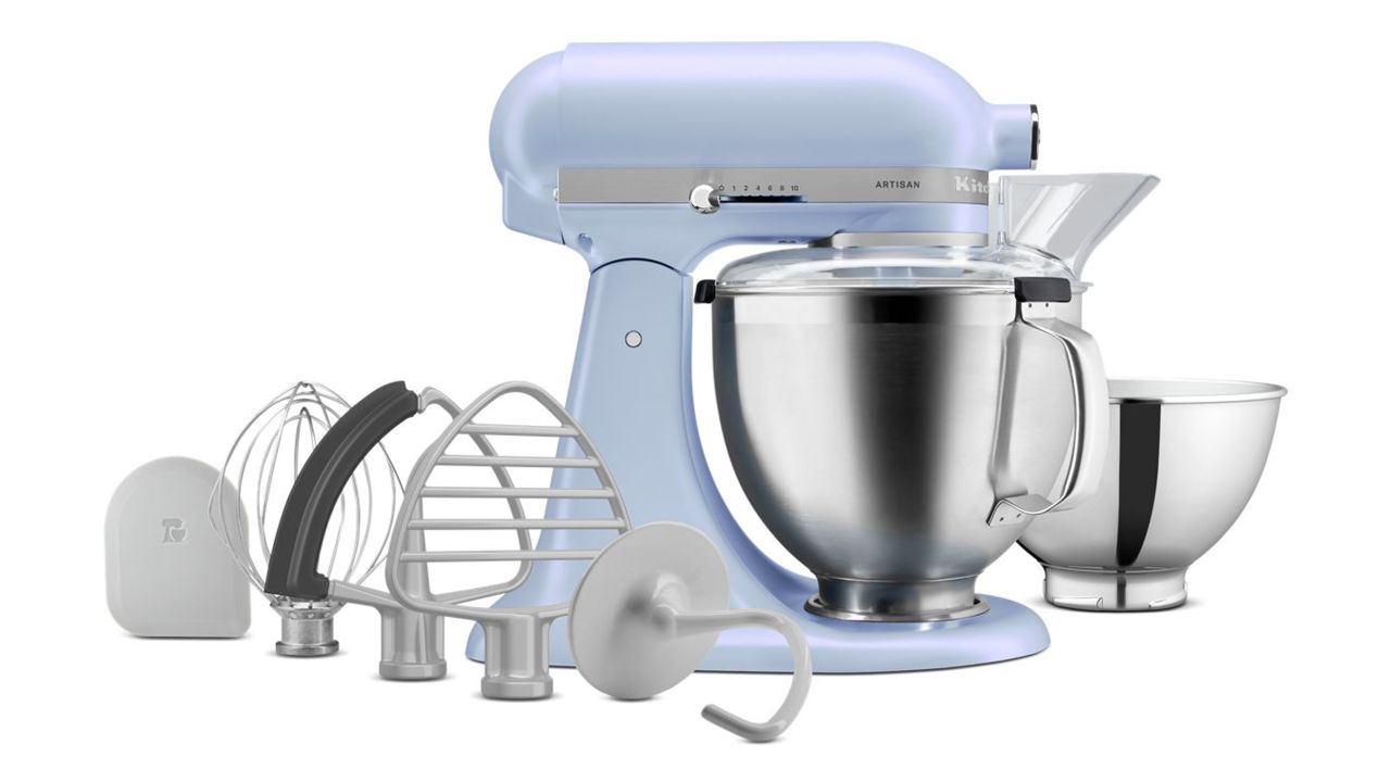 Blue KitchenAid stand mixer with attachments