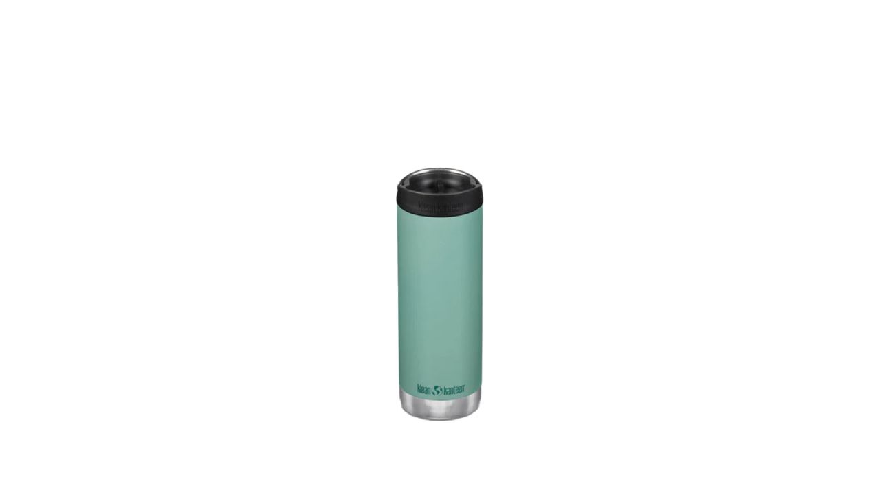 Mint green water bottle placed against white background.