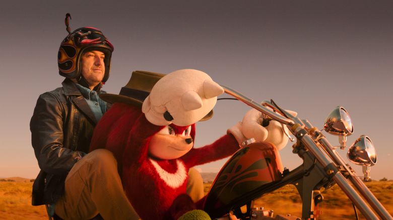 L-R: Adam Pally as Wade Whipple and Knuckles (voiced by Idris Elba) in Knuckles, episode 4, season 1, streaming on Paramount+, 2024. Photo Credit: Paramount Pictures/Sega/Paramount+.