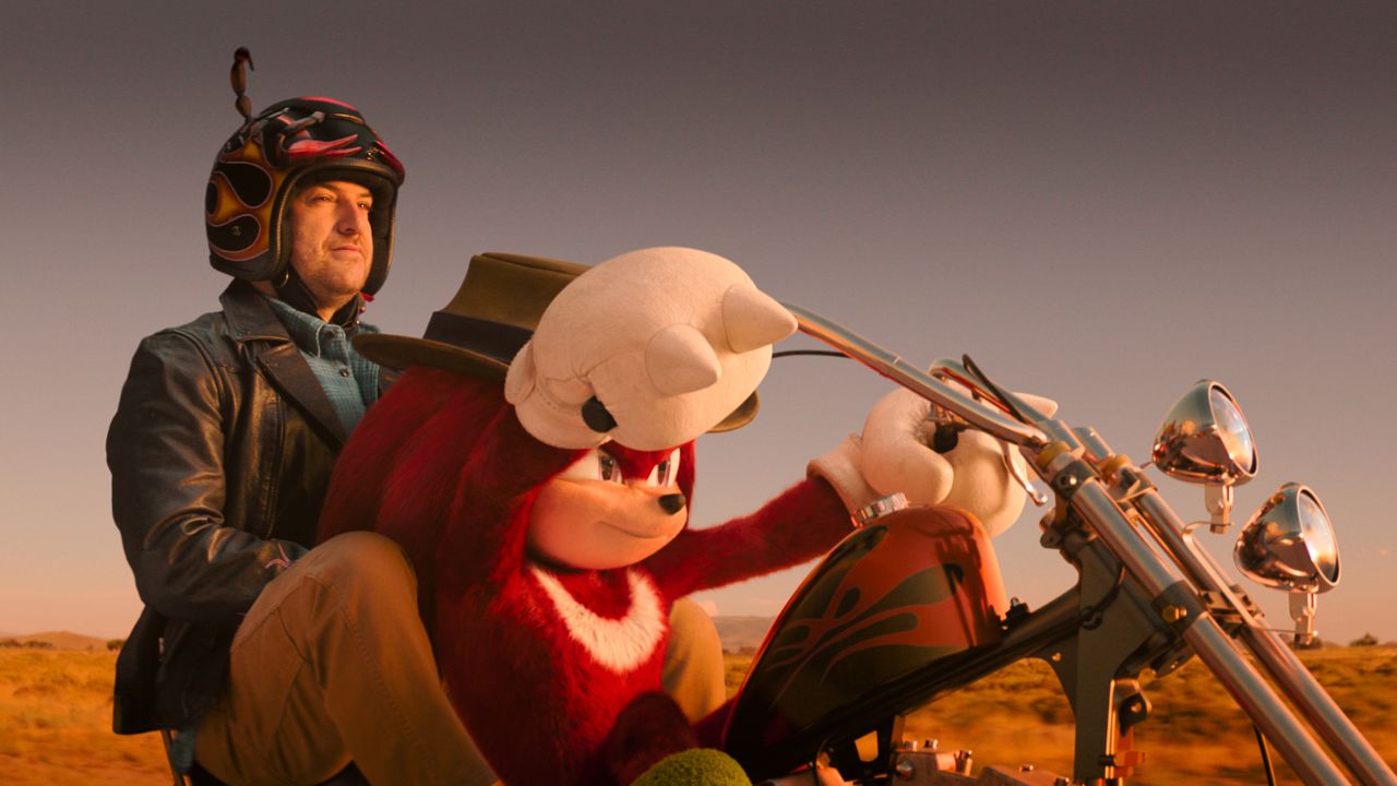 L-R: Adam Pally as Wade Whipple and Knuckles (voiced by Idris Elba) in Knuckles, episode 4, season 1, streaming on Paramount+, 2024. Photo Credit: Paramount Pictures/Sega/Paramount+.