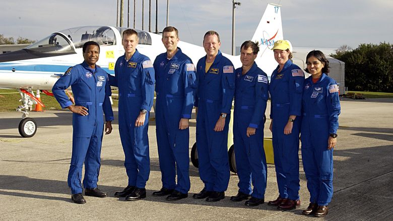 KENNEDY SPACE CENTER, FLA. --  The STS-107 crew arrives at KSC to take part in Terminal Countdown Demonstration Test activities.   Standing, left to right, are Payload Commander Michael Anderson, Pilot William "Willie" McCool, Commander Rick Husband, Mission Specialist David Brown, Payload Specialist Ilan Ramon (the first Israeli astronaut), and Mission Specialists Laurel Clark and Kalpana Chawla.  STS-107 is a mission devoted to research and will include more than 80 experiments that will study Earth and space science, advanced technology development, and astronaut health and safety.  