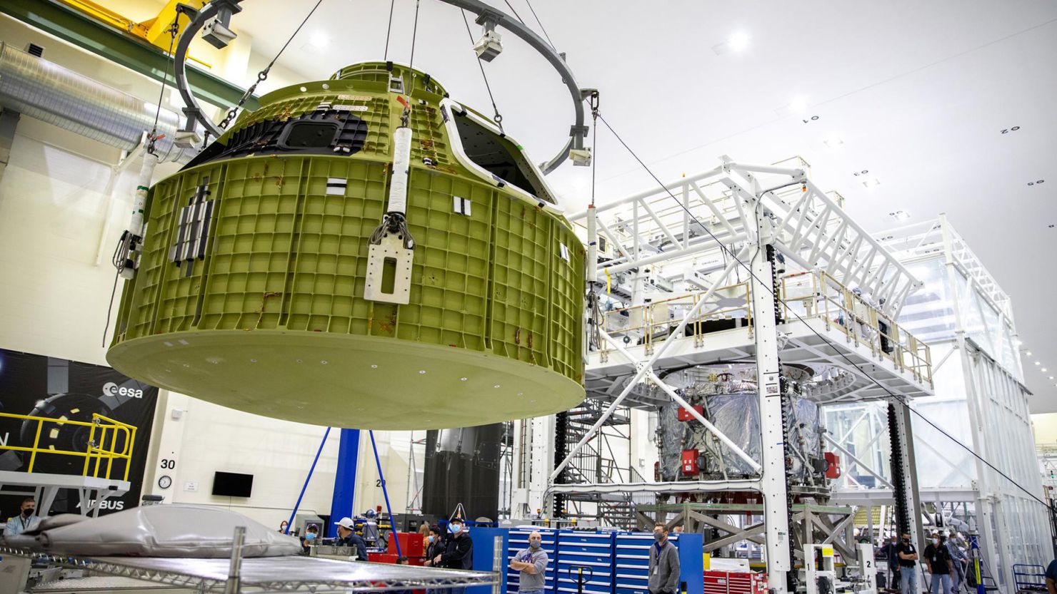 The Orion pressure vessel for NASA’s Artemis III mission is shown being lifted by crane for its move onto a work stand at NASA’s Kennedy Space Center in Florida in 2021.