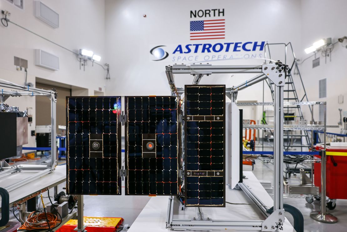 One of the PUNCH satellites can be seen with its solar arrays deployed.