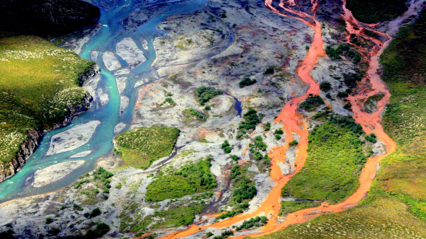 An aerial view of the rust-colored Kutuk River in Gates of the Arctic National Park in Alaska.