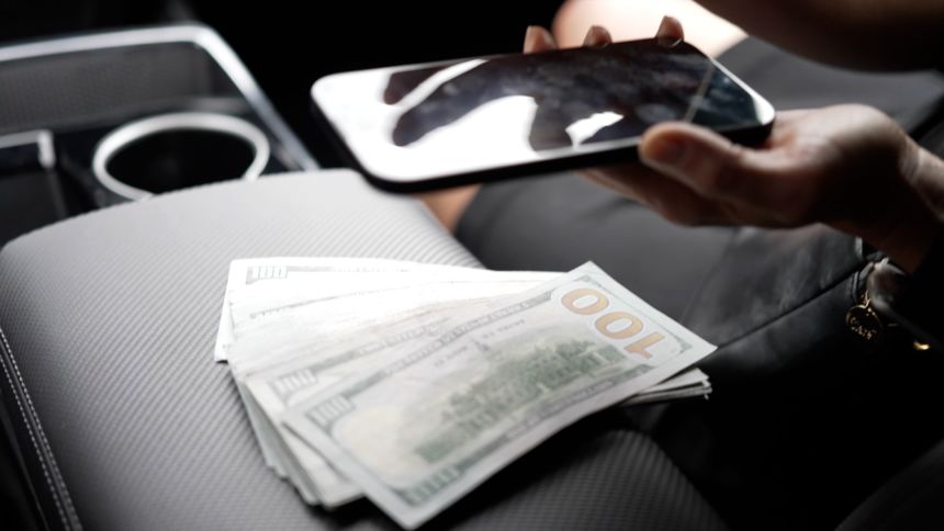 Kyung Scam Cash.jpg