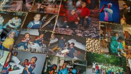 Photos of Qaadir and Naazir Lewis are arranged on a table at a family home in Lithonia, Georgia.