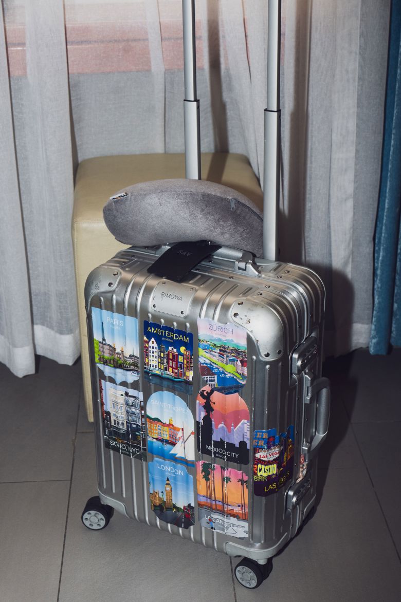 Bayat's luggage features some of the destinations she's been to as part of her side job as a wedding content creator.