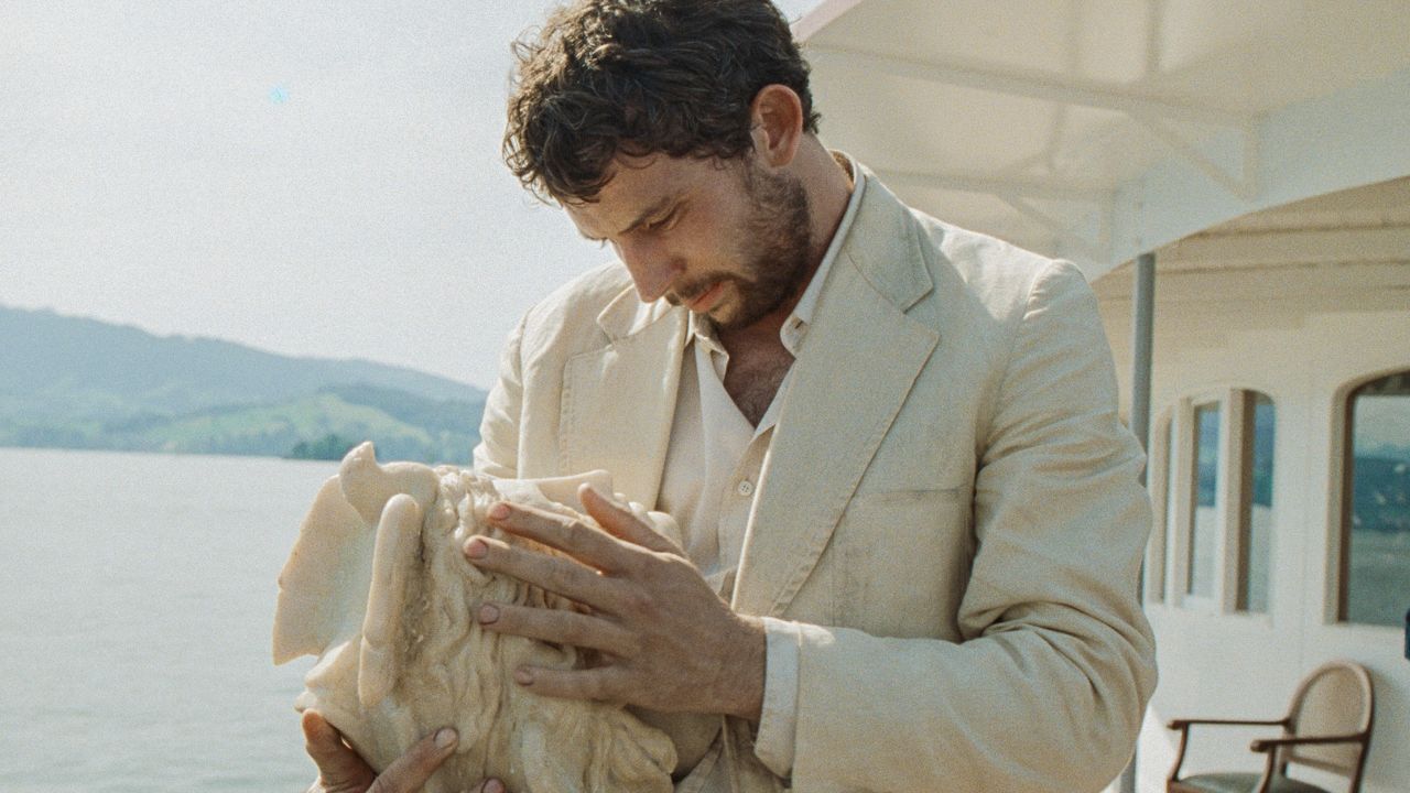 Josh O'Connor as Arthur, a conflicted grave robber in Alice Rohrwacher's film "La Chimera."