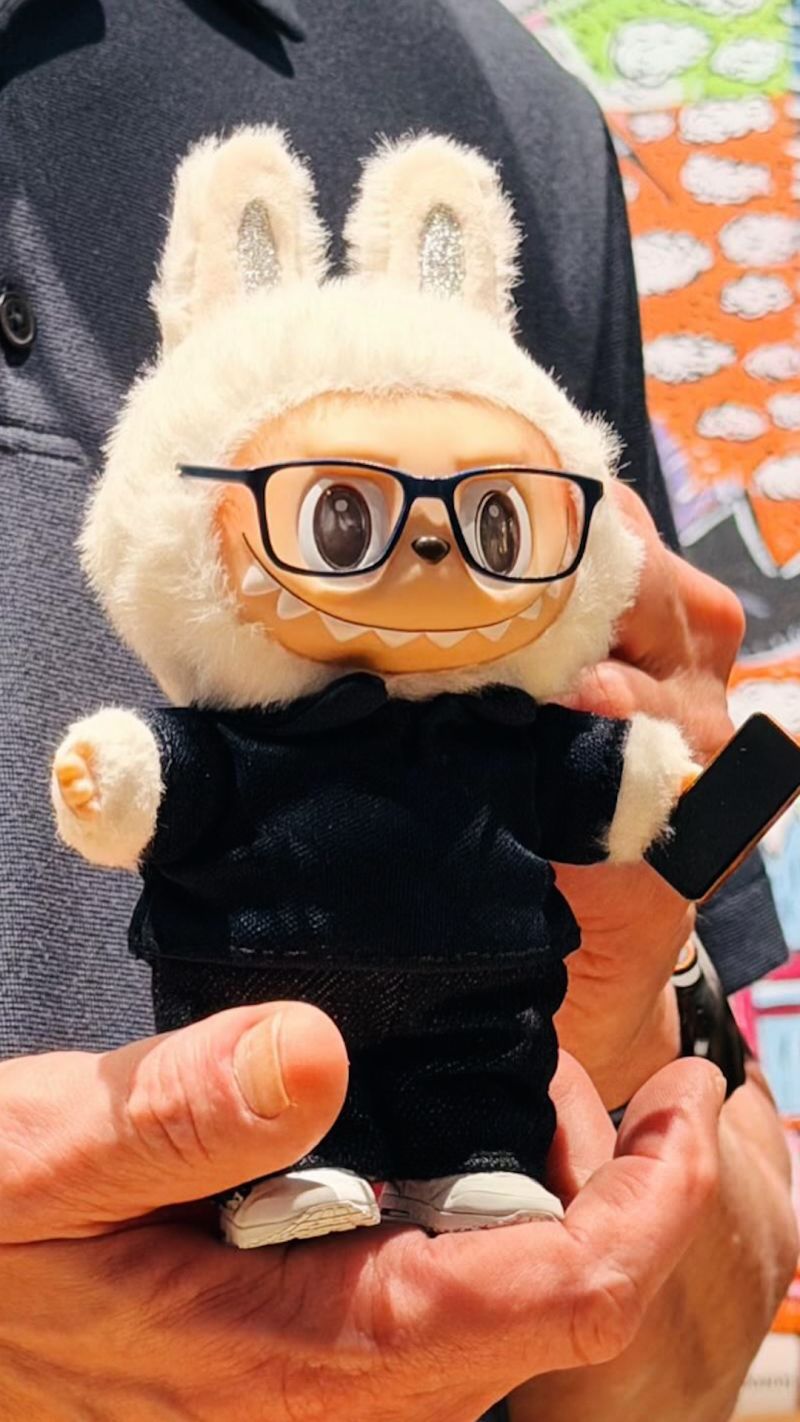 Apple CEO receives lookalike Labubu doll | CNN