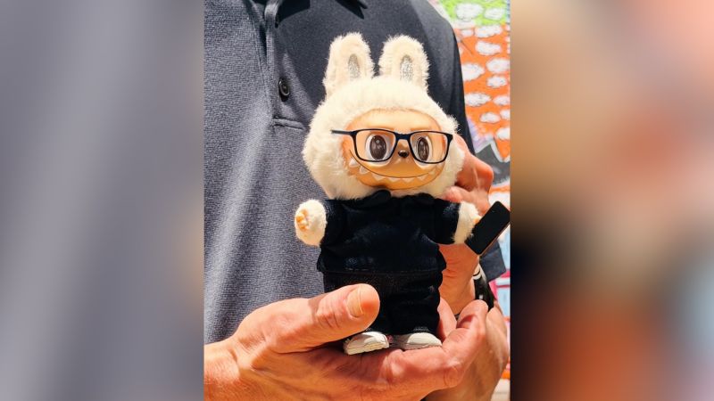 Apple CEO receives lookalike Labubu doll | CNN