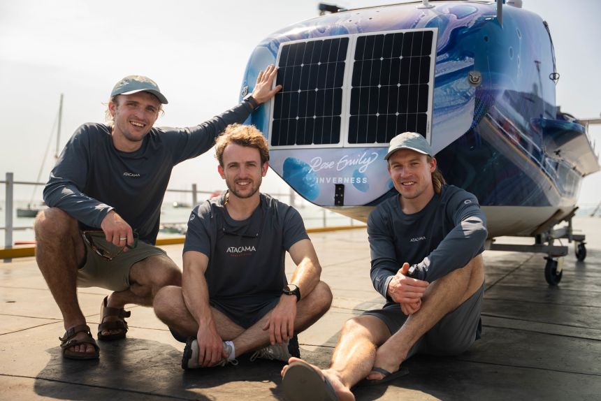 (From left) Lachlan, Ewan and Jamie Maclean pose with their boat, "Emily-Rose." The boat was named in tribute to their unborn sister.