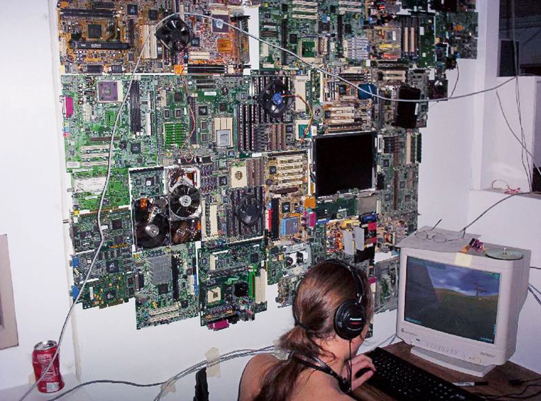 A collage of motherboards features as wall decor in a gamer's room in St. Charles Parish, Louisiana.