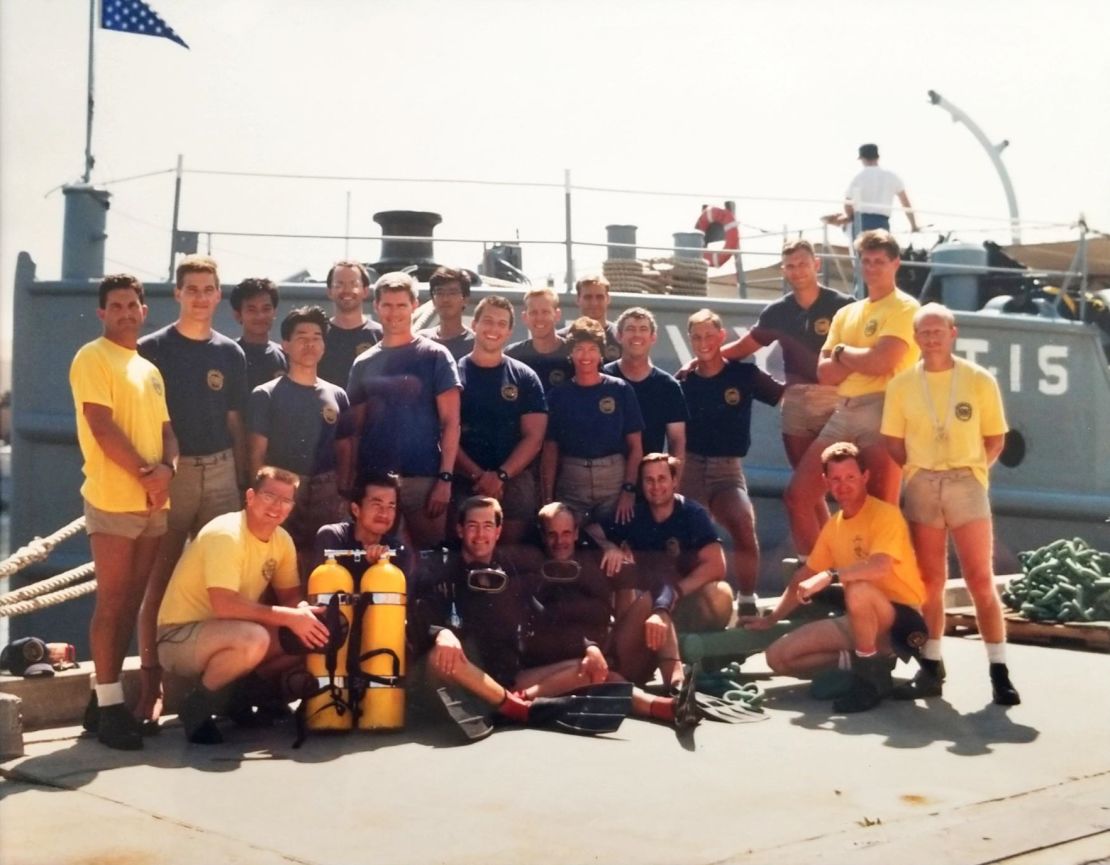 Jonathan Clark met his future wife, Mission Specialist Laurel B. Clark, at US Navy diving school in 1989. Laurel (near center) was the only woman who completed the course. Jonathan is seen standing behind her right shoulder.