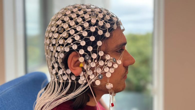 Researcher Kristian Jensen wearing the high-density headset for LDAEP. The headset comprises 256 electrodes, plus earphones; these can give sound tones ranging from around 60dB (which is as loud as a conversation) to 100dB (as loud as a loud hairdryer).