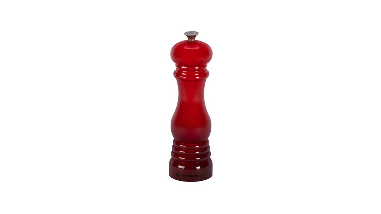 A red ceramic pepper mill.