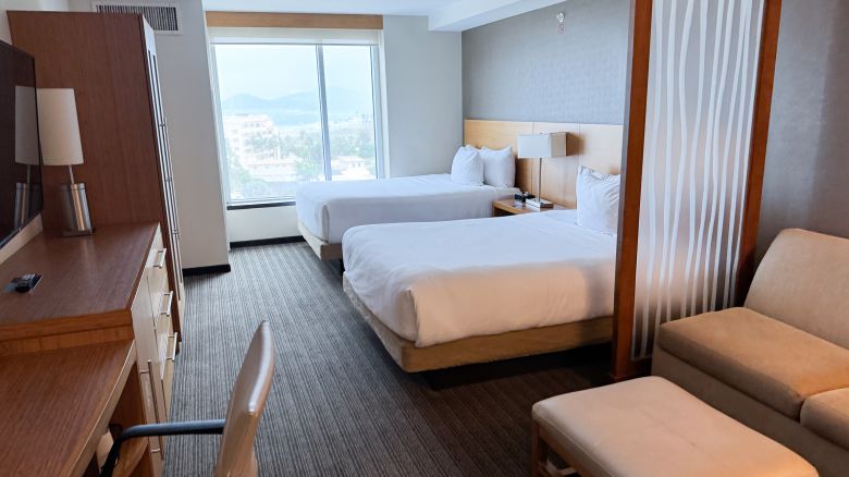 A room with two queen beds at the Hyatt Place Los Cabos