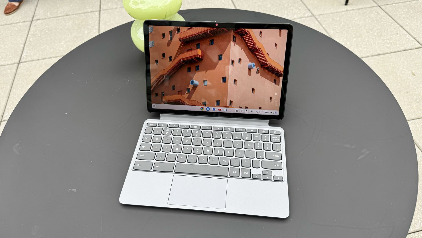 The Lenovo Chromebook Duet 11" in laptop mode on a table