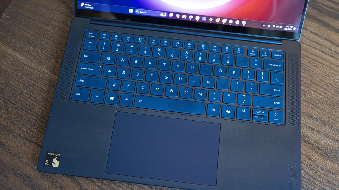 A close-up of the Lenovo yoga slim 7x's blue keyboard deck and trackpad