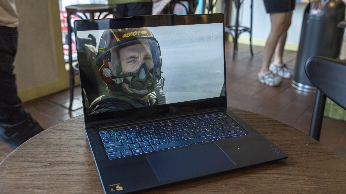 the lenovo yoga slim 7x is playing top gun maverick, where we see Miles Teller as Rooster