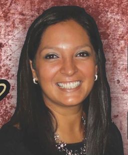 Lisa Lopez-Galvan, seen in this undated photo, was killed in Wednesday's shooting, according to her employer, KKFI 90.1 FM.