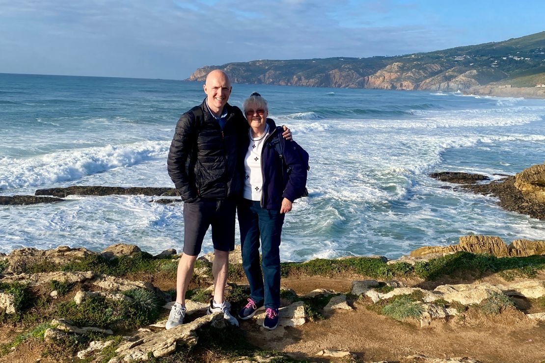 Rick Blyth poses along the shore near Lisbon, Portugal, with his mother.