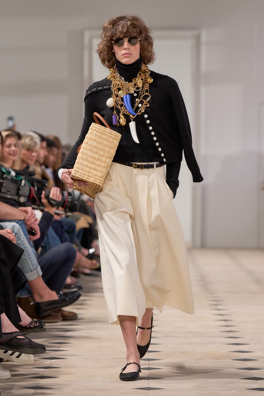 Peers such as fashion designers Jonathan Anderson and Raf Simons also turned up to show their support.