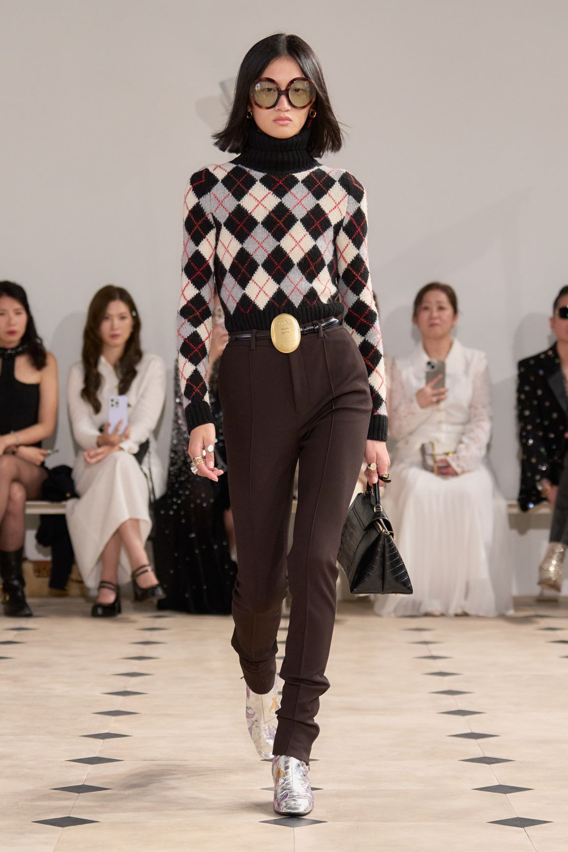 Celine's new designer Michael Rider introduced plenty of historical references from the French luxury house's archives as well as his own history.