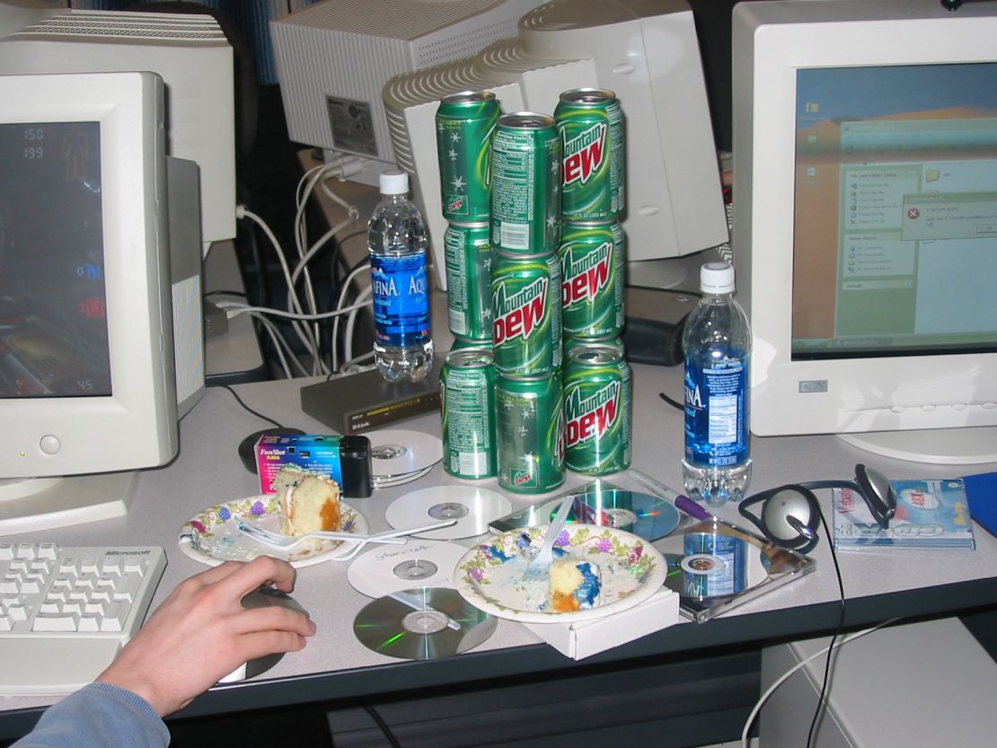 Most of the players in "LAN Party" are groups of white men, with only a few women and people of color featured. Cartons of Mountain Dew and Bawls, energy drinks that have come to be culturally associated with gamers, are a recurring theme — so much so that Mountain Dew released a line of products called “Game Fuel” in 2007.