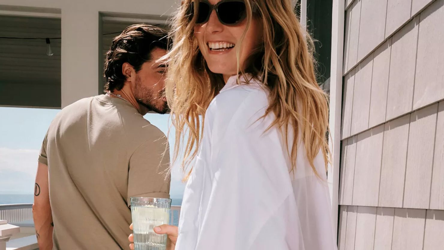 Closeup of two people outside wearing the Lululemon LuluLinen collection.