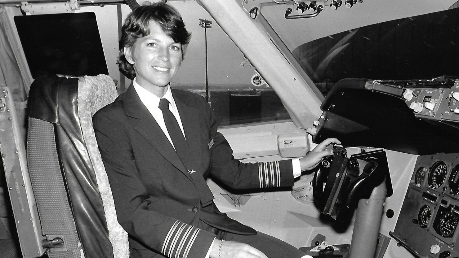 Lynn Rippelmeyer sits in the captain's seat of a Boeing 747 in 1984, seven years after she piloted a flight that made aviation history.