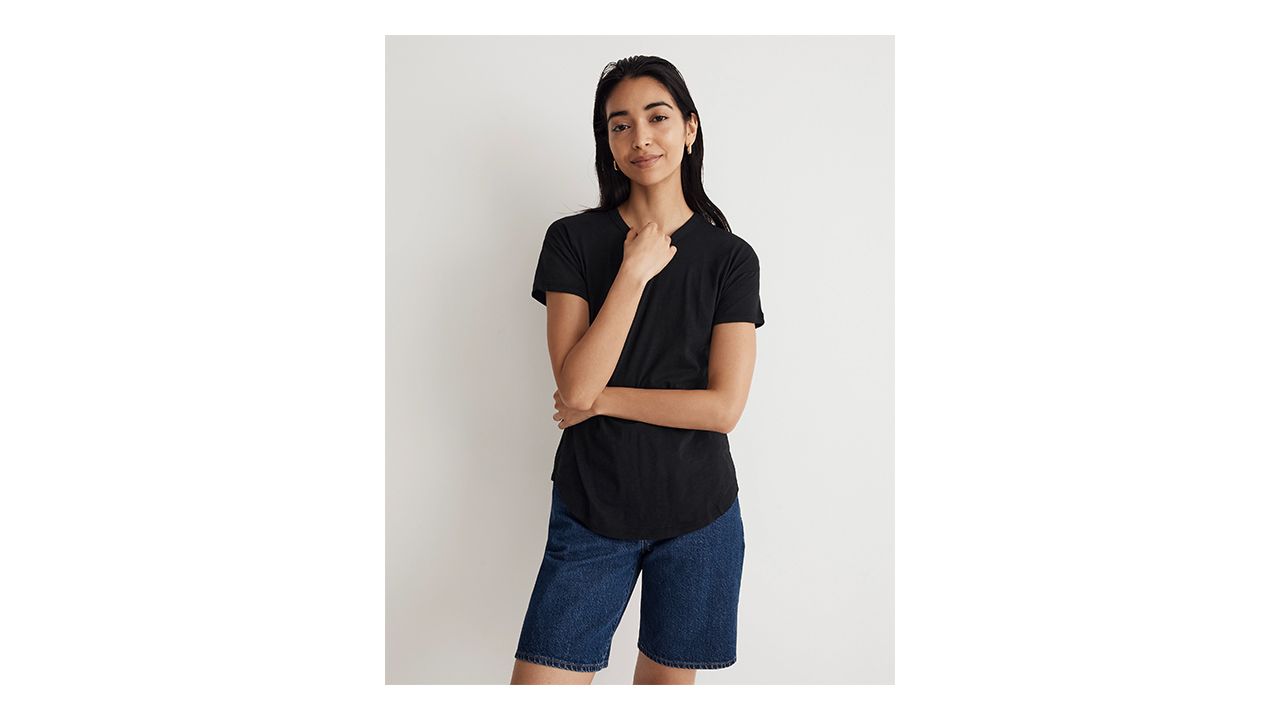 A photo of a person wearing a black Madewell t-shirt