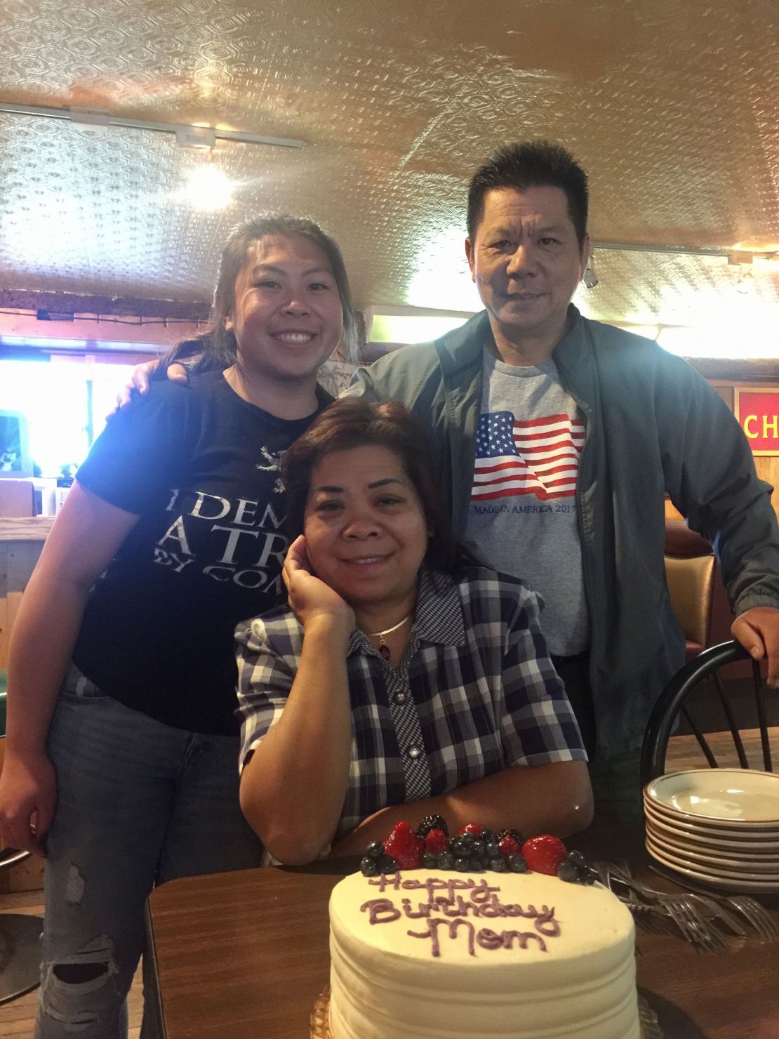 Maggie lived with her parents, Hy (center) and San Long in Bailey, Colorado.