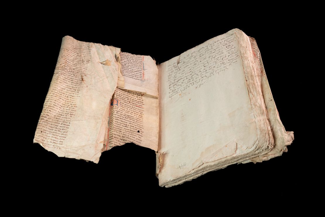 The pages were folded, torn and stitched together to create a cover for 16th century property records.