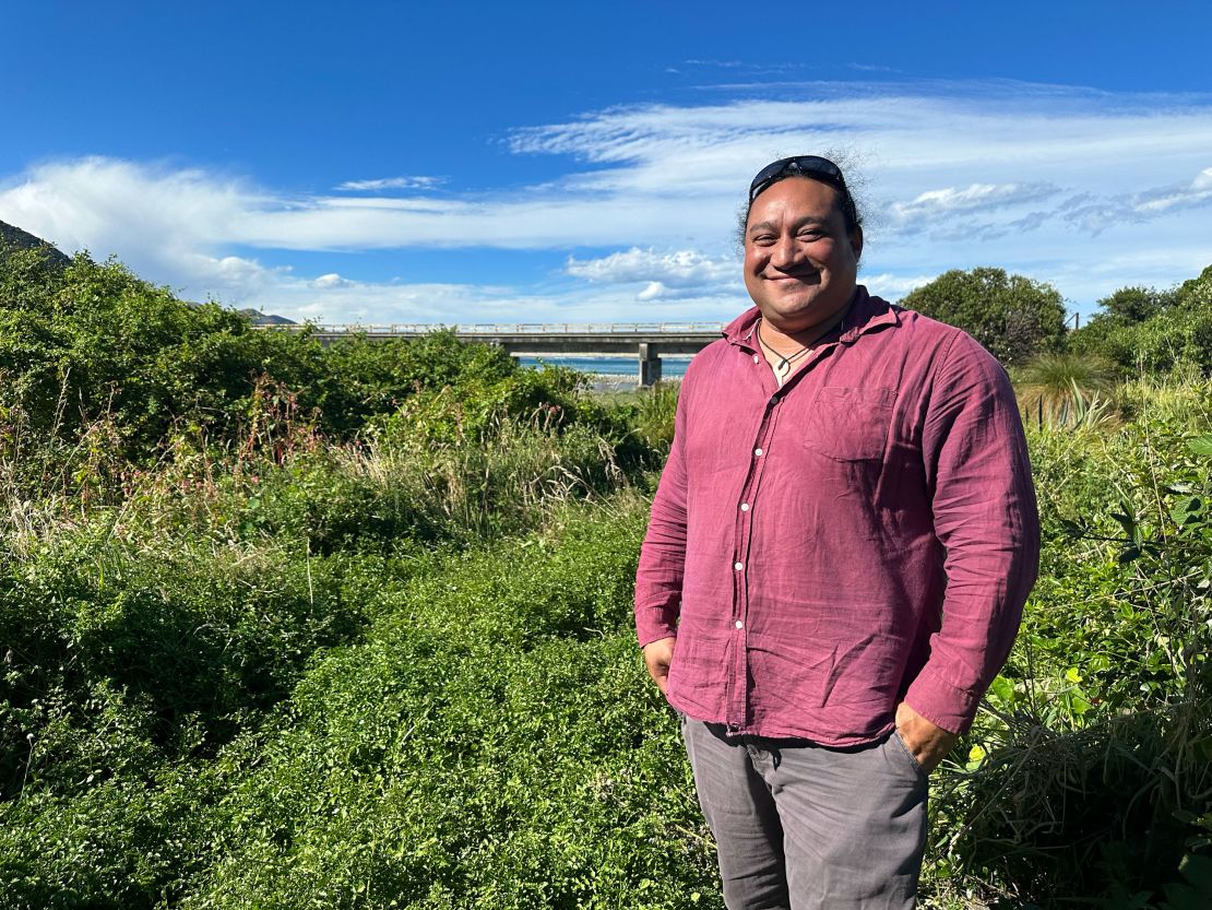 Rawiri Manawatu, head of Te Rūnanga o Kaikōura, stands by the Oaro River where his team is cleaning out the waterway and planting native trees to restore the local ecosystem.