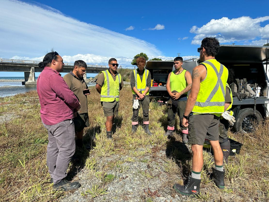 The Te Rūnanga o Kaikōura team blessing the land in Kaikōura, where they spend the day cleaning out a river.