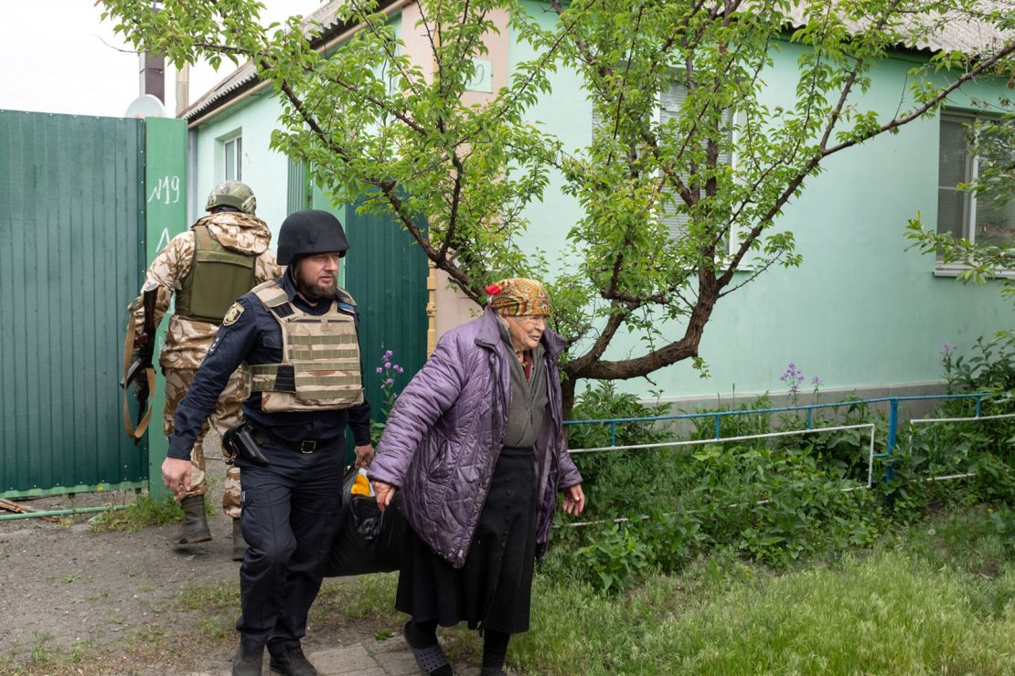  Maria, 85, evacuates the Ukrainian town of Vovchansk.