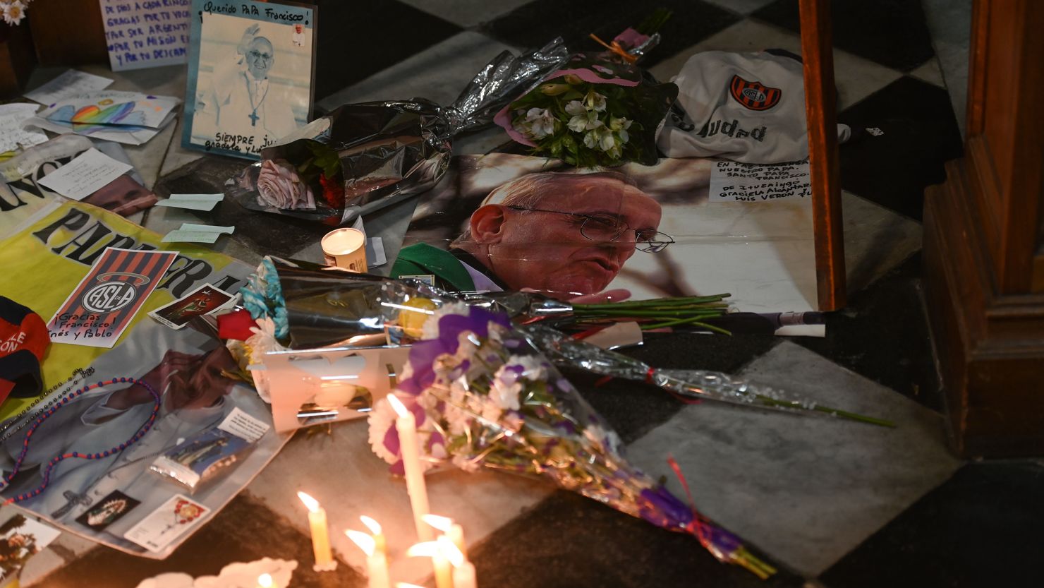 Photographs of Pope Francis are seen in the confessional of the Basílica de San José de Flores during a Mass in Buenos Aires, Argentina, on Tuesday, April 22.
