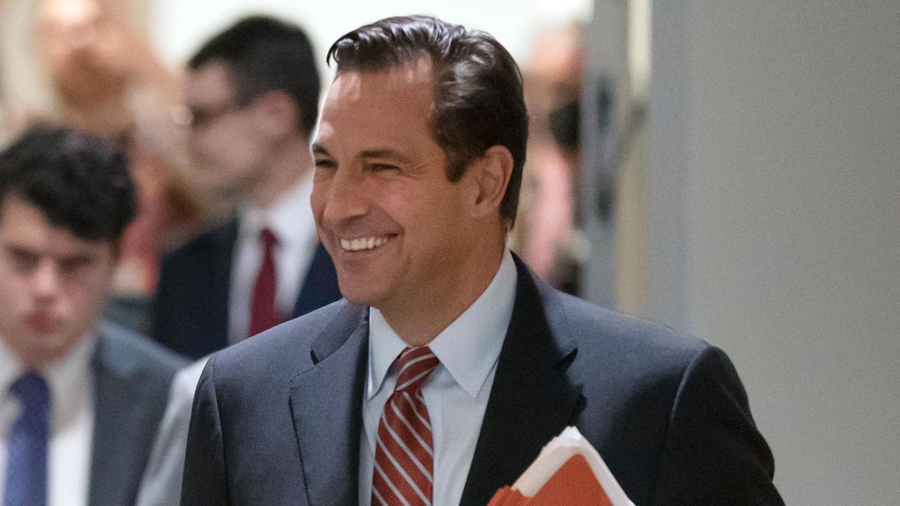 In this September 2022 photo, lawyer Mark Paoletta walks with conservative activist Virginia "Ginni" Thomas, the wife of Supreme Court Justice Clarence Thomas, not seen, to a room at the O'Neill House Office Building in Washington, DC. 